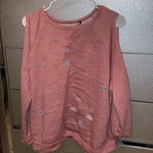 It’s a long sleeve shirt with holes in them